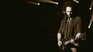 a man playing guitar